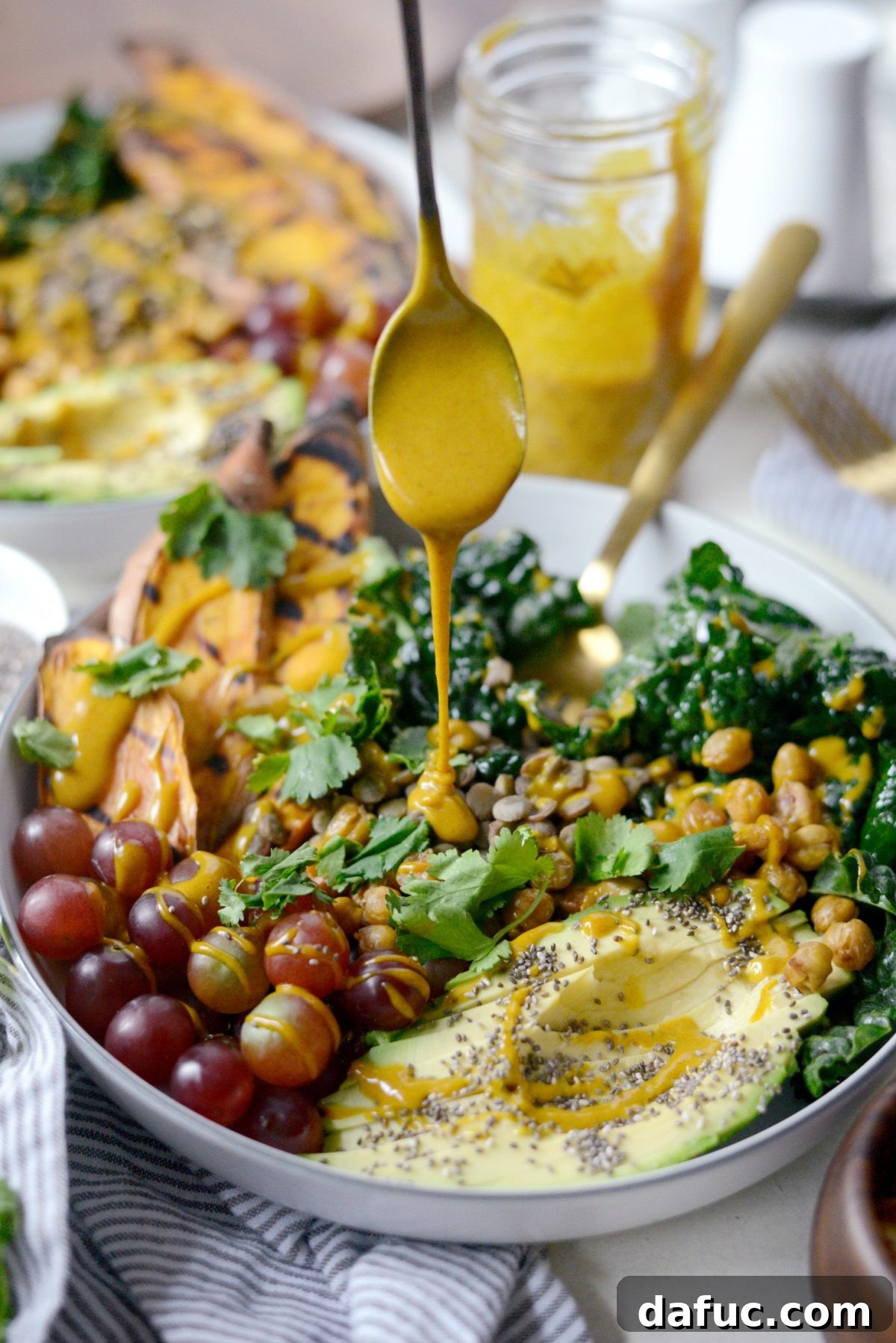 Zen Sweet Potato Bowl 16 drizzle salad with dressing