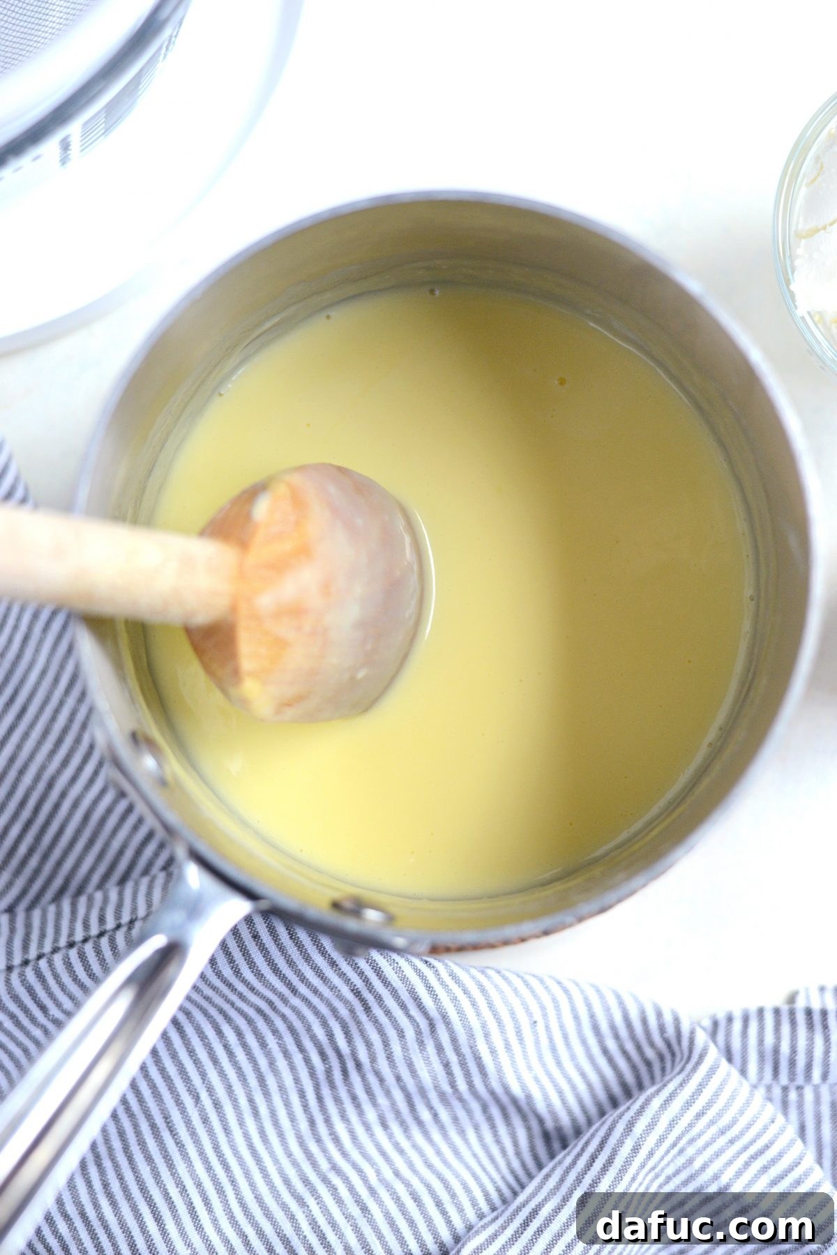 Stirring and heating the ice cream base