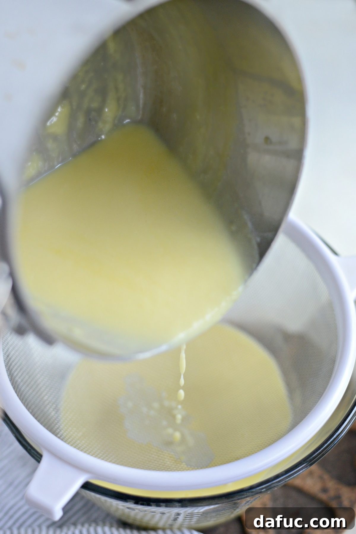 Straining the ice cream base