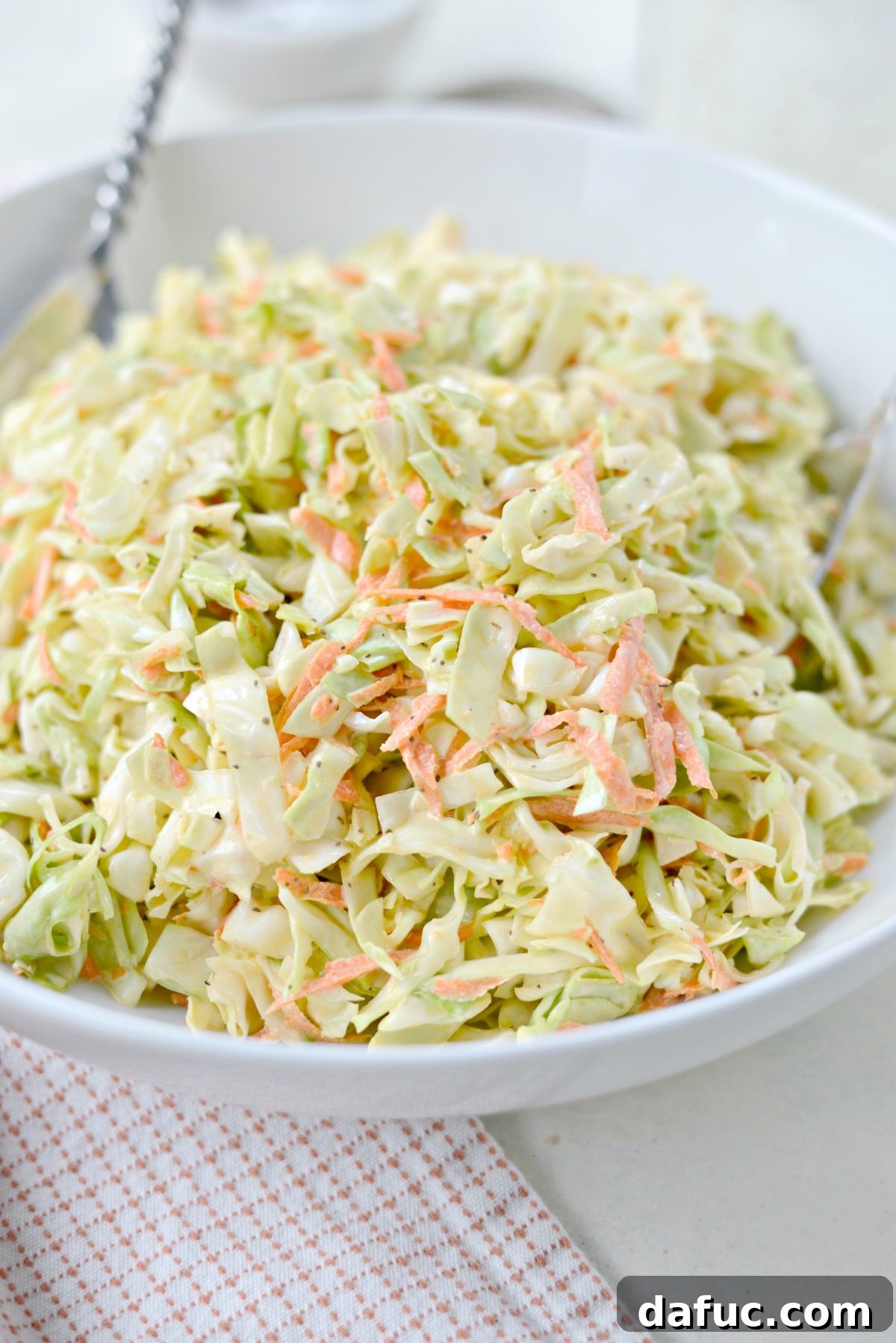 Perfect Classic Coleslaw From Scratch 3 Close-up of creamy, crunchy Classic Coleslaw in a white bowl