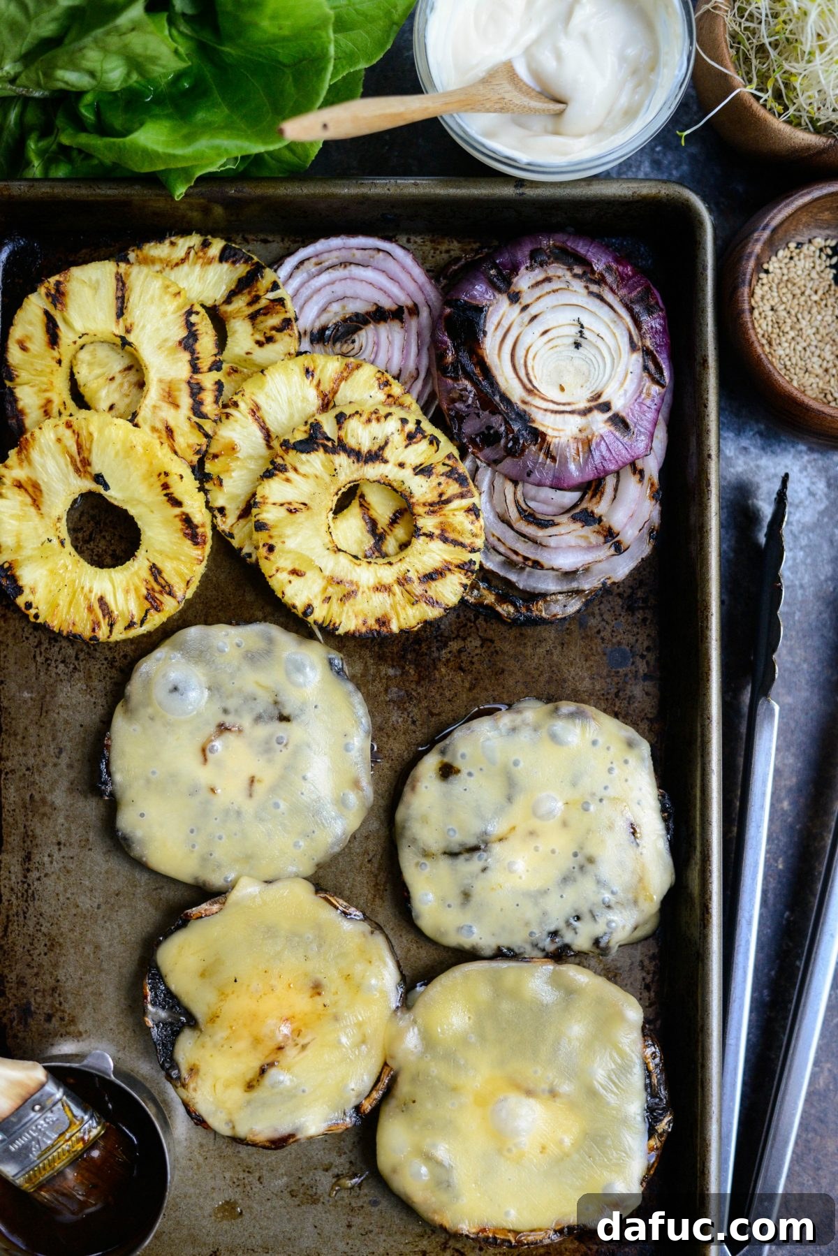 Grilled Teriyaki Portobello Burgers Sweet Heat Wasabi Aioli 14 Freshly Grilled Teriyaki Portobello Burgers, Pineapple, and Red Onion on a Tray