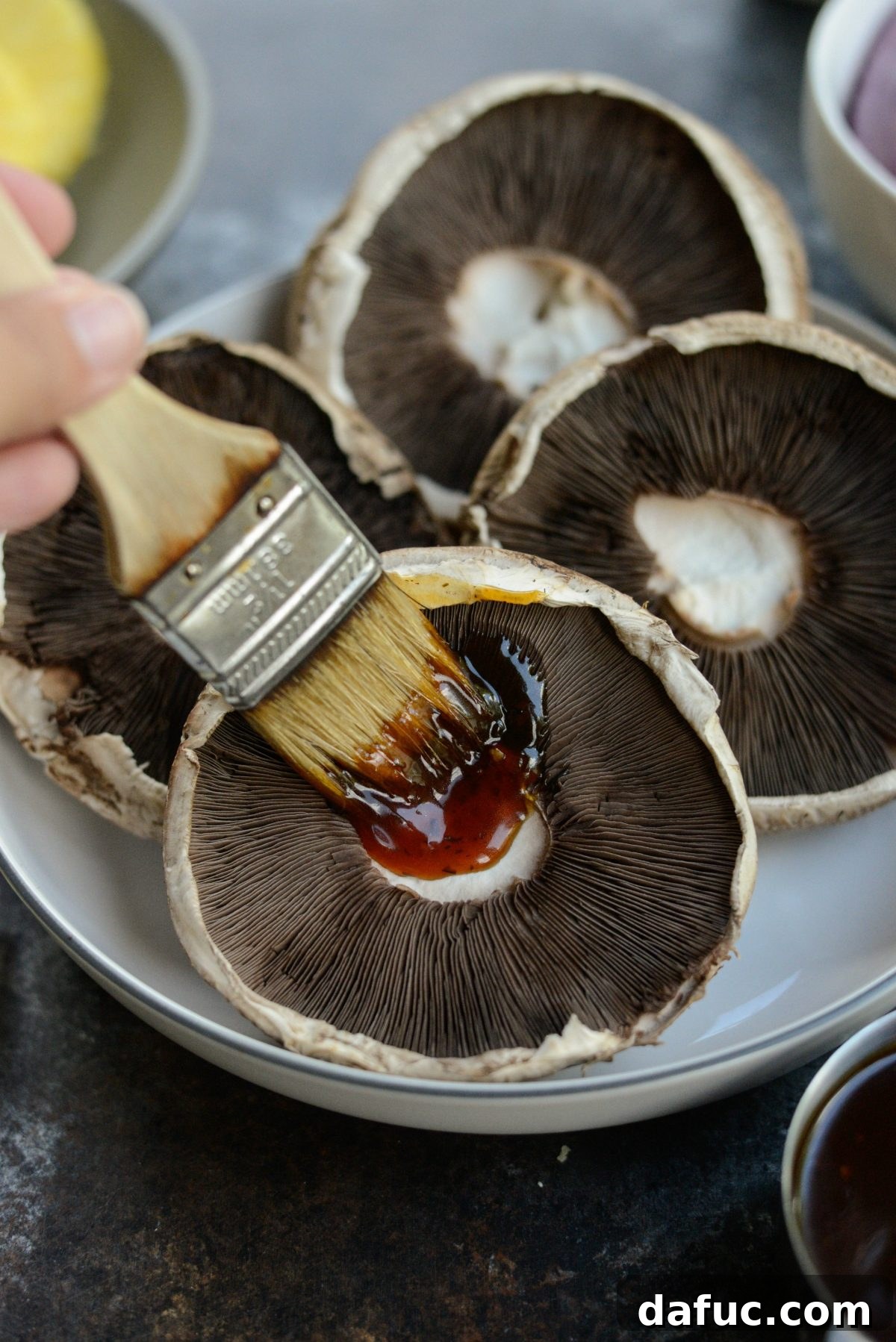 Grilled Teriyaki Portobello Burgers Sweet Heat Wasabi Aioli 8 Brushing Teriyaki Sauce onto Portobello Mushroom Caps