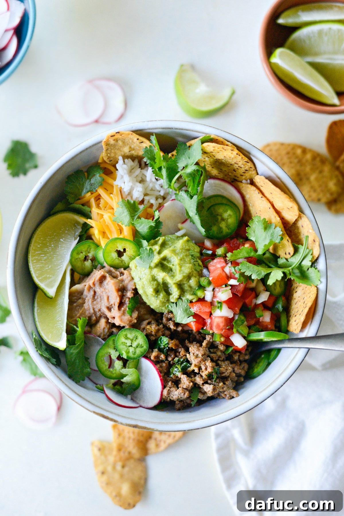 Beefy Bean Burrito Bowls 2 Delicious Cheesy Beef and Bean Burrito Rice Bowls for dinner