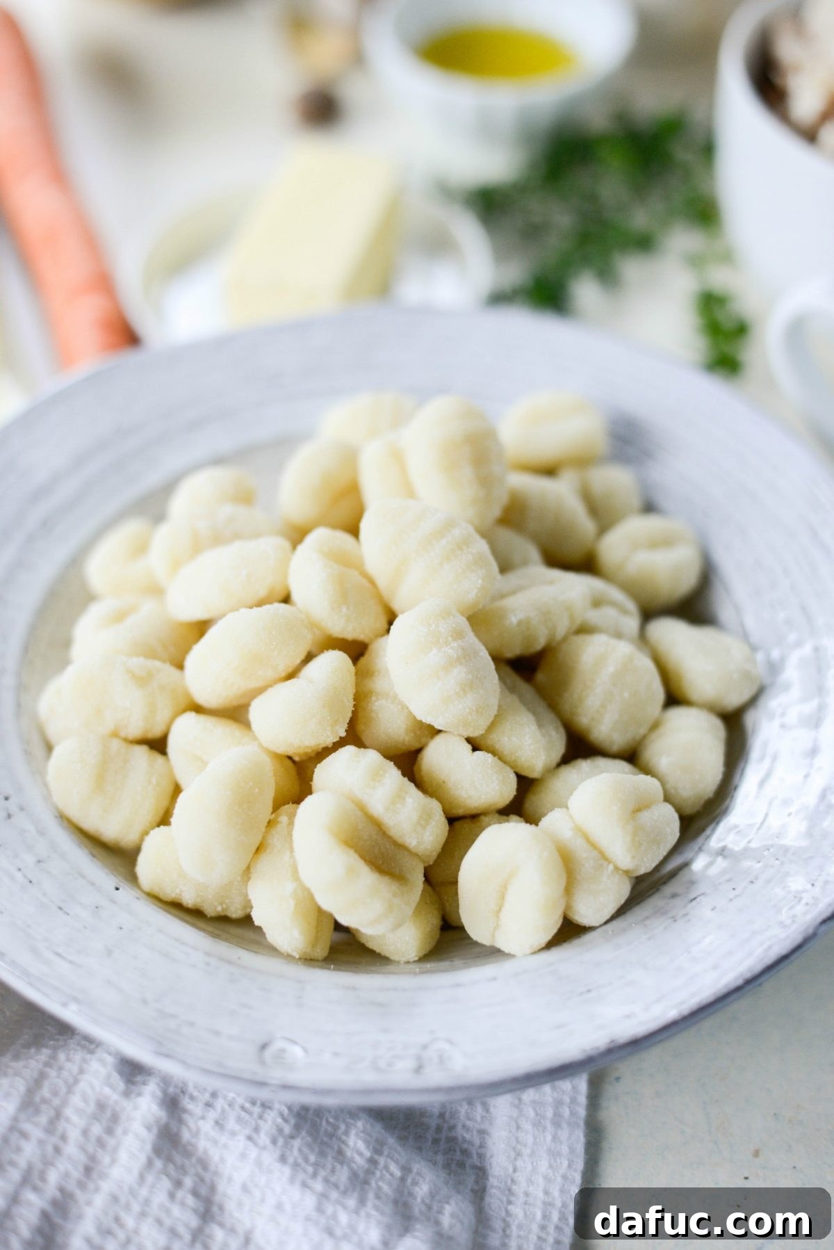Potato gnocchi in a bowl, ready for cooking