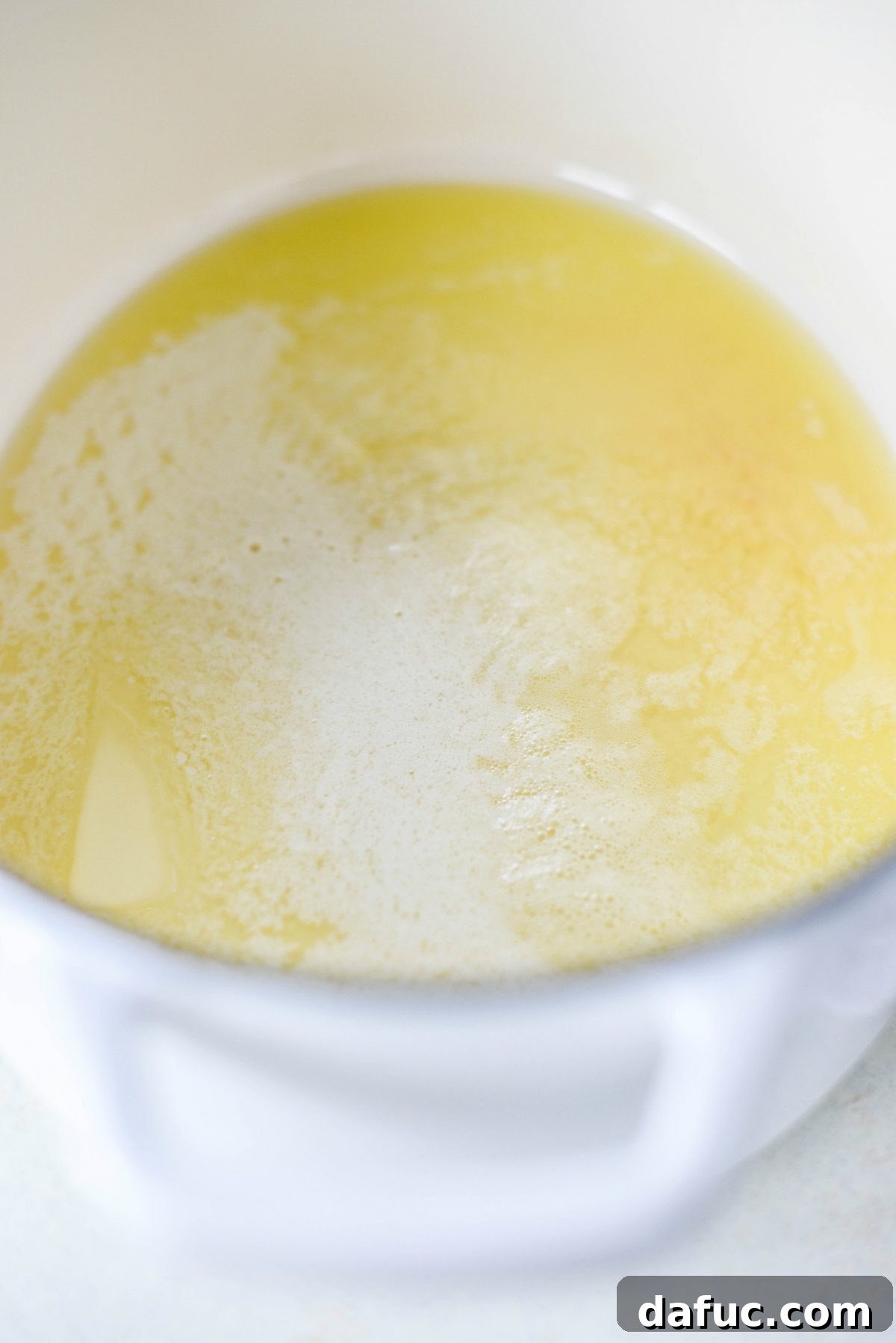 Melting butter in a Dutch oven, starting the soup base