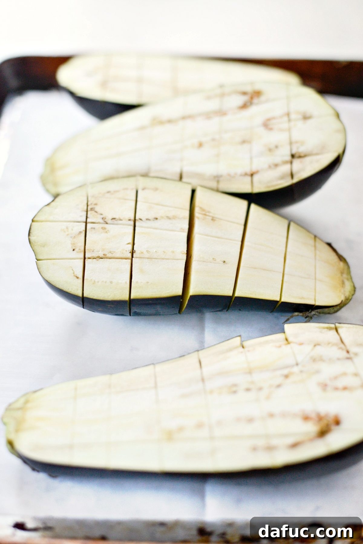 Pecorino Crusted Eggplant Bake 5 score eggplant halves