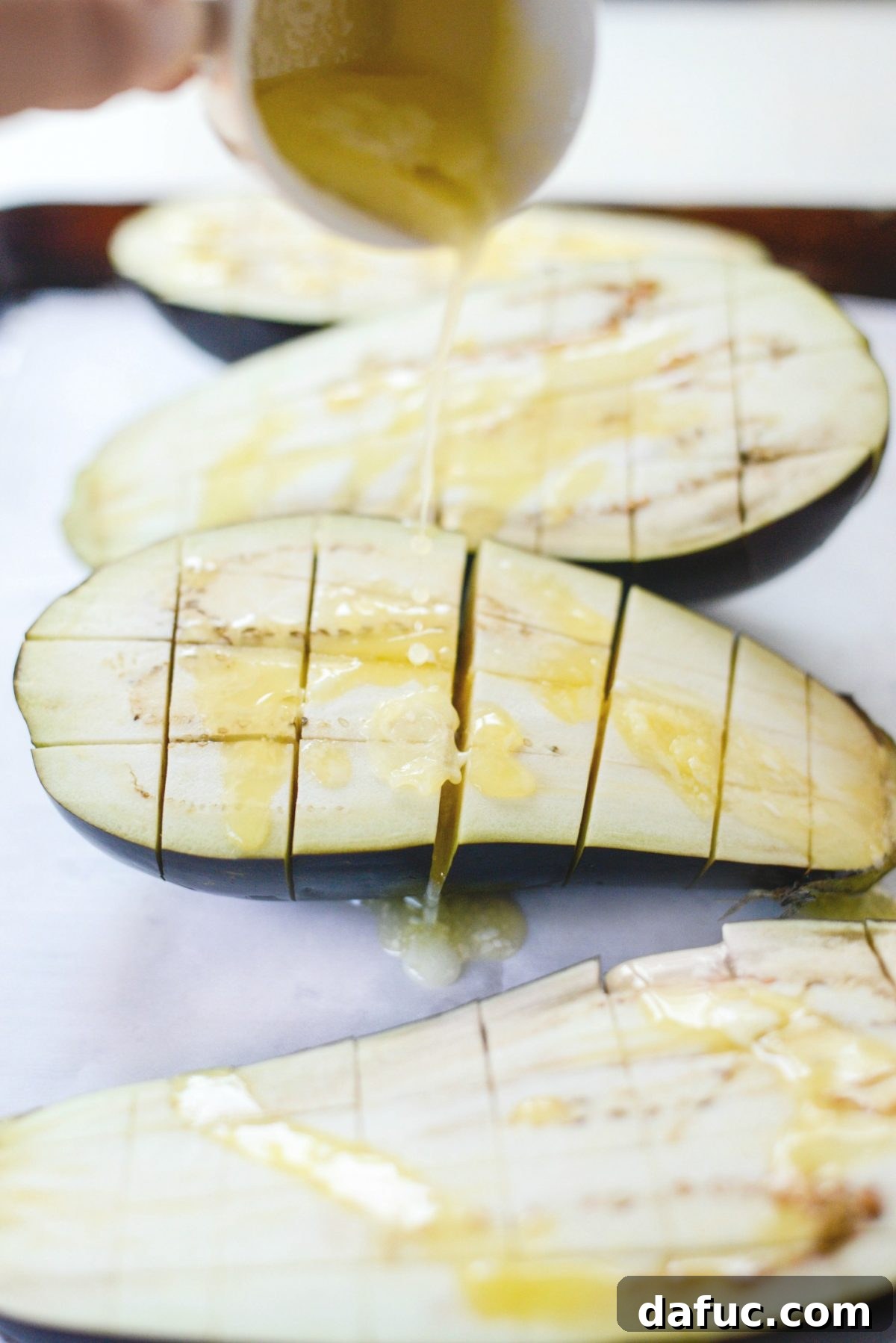 Pecorino Crusted Eggplant Bake 6 Drizzle butter over eggplant