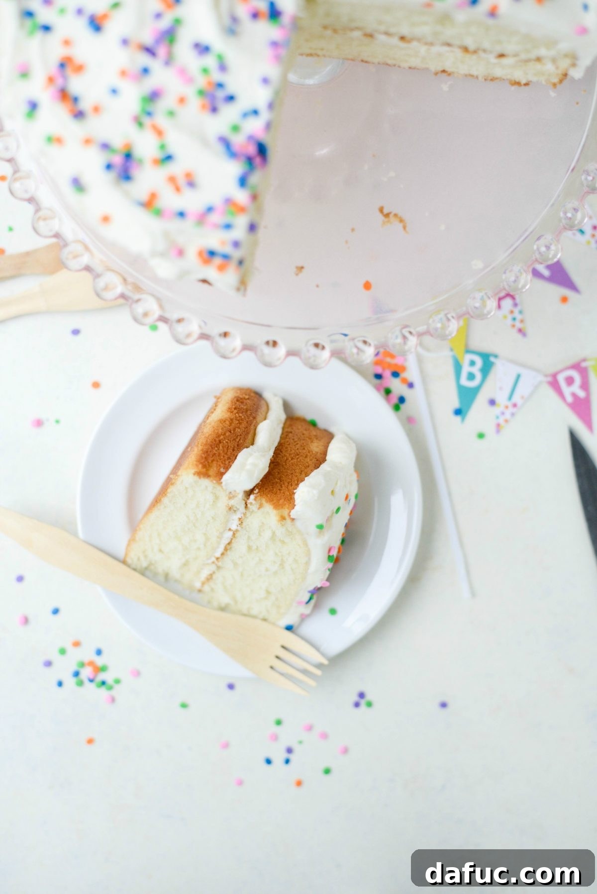 Slice of White Cake with White Buttercream Frosting