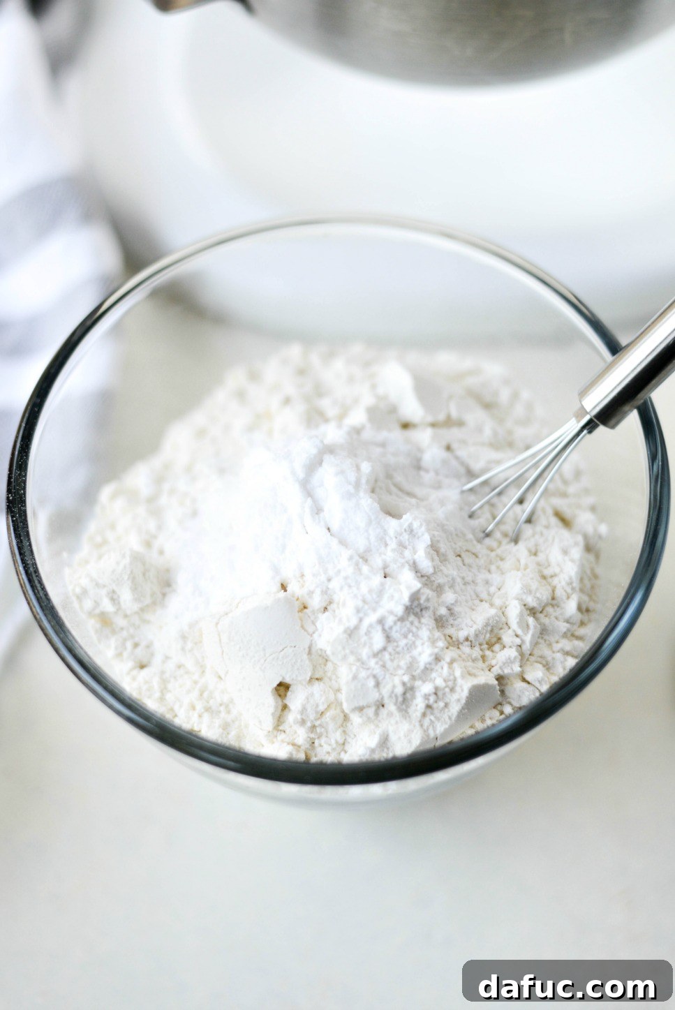 Golden Cinnamon Sugar Delights 9 Dry ingredients (flour, cream of tartar, baking soda, salt) combined in a bowl.