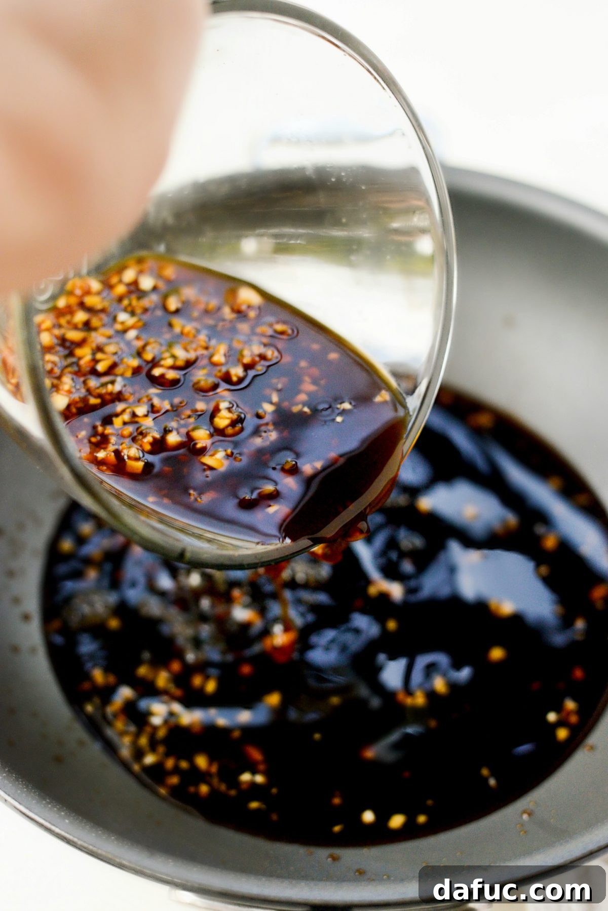 Speedy Sesame Mongolian Beef 11 Removing excess oil from pan before adding sauce
