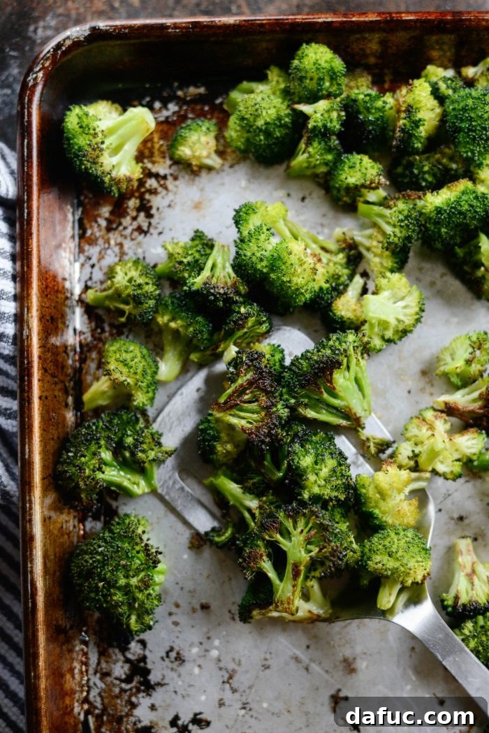 The Best 10-Minute Roasted Broccoli Recipe - A close-up of crispy, golden-brown roasted broccoli florets ready to serve.