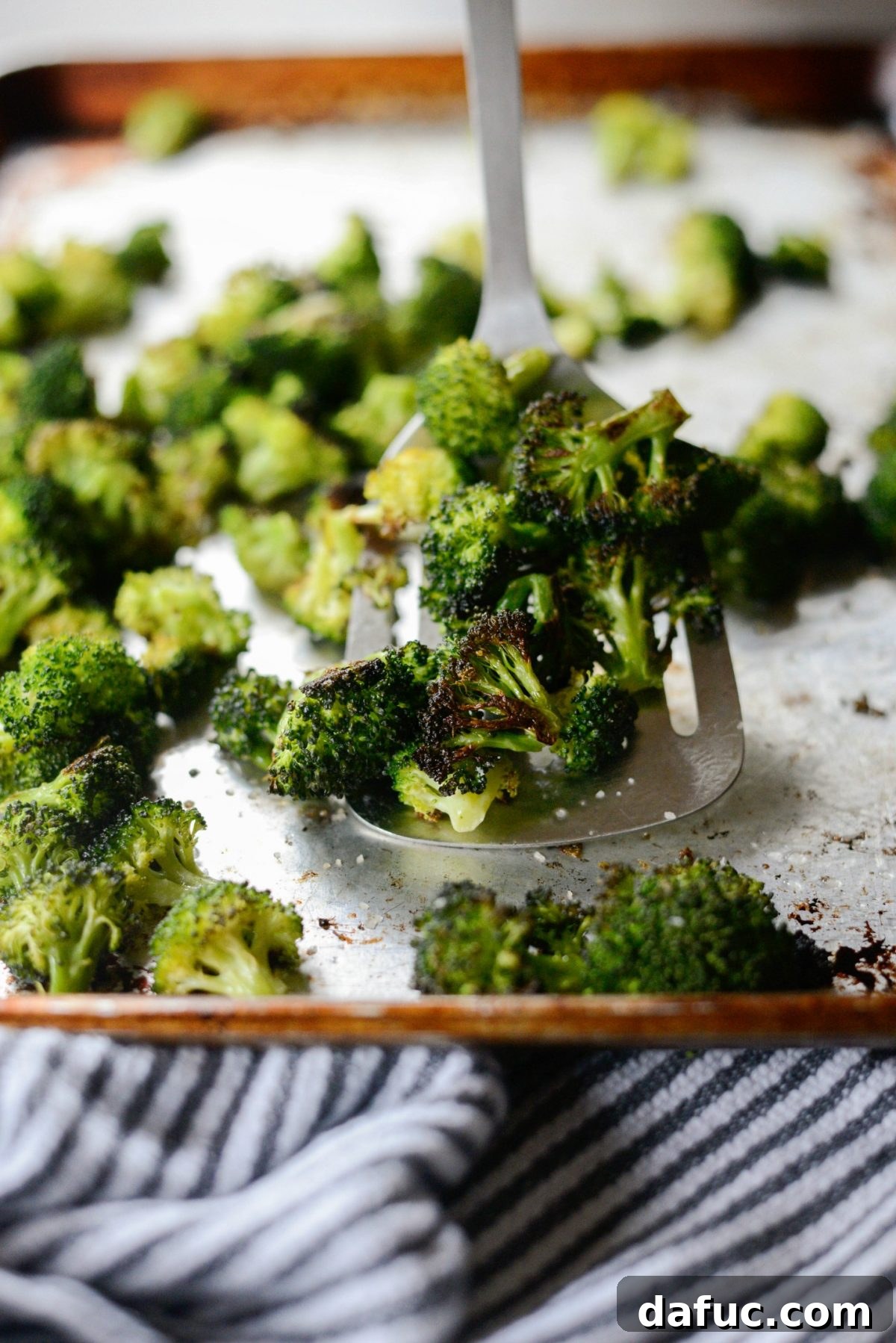 Another enticing shot of 10-Minute Roasted Broccoli, highlighting its golden color and crispy texture.