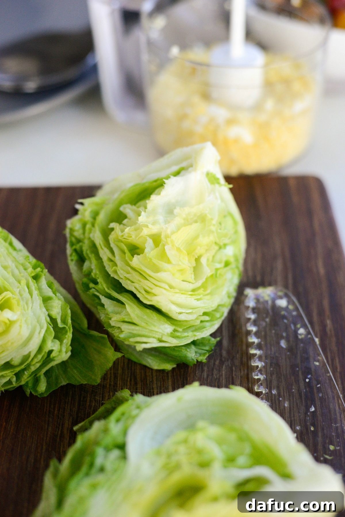 Our Signature Loaded Wedge, Drenched in Peppercorn Buttermilk 8 Crisp iceberg lettuce heads cut into perfect wedges, ready for assembly into a loaded salad.