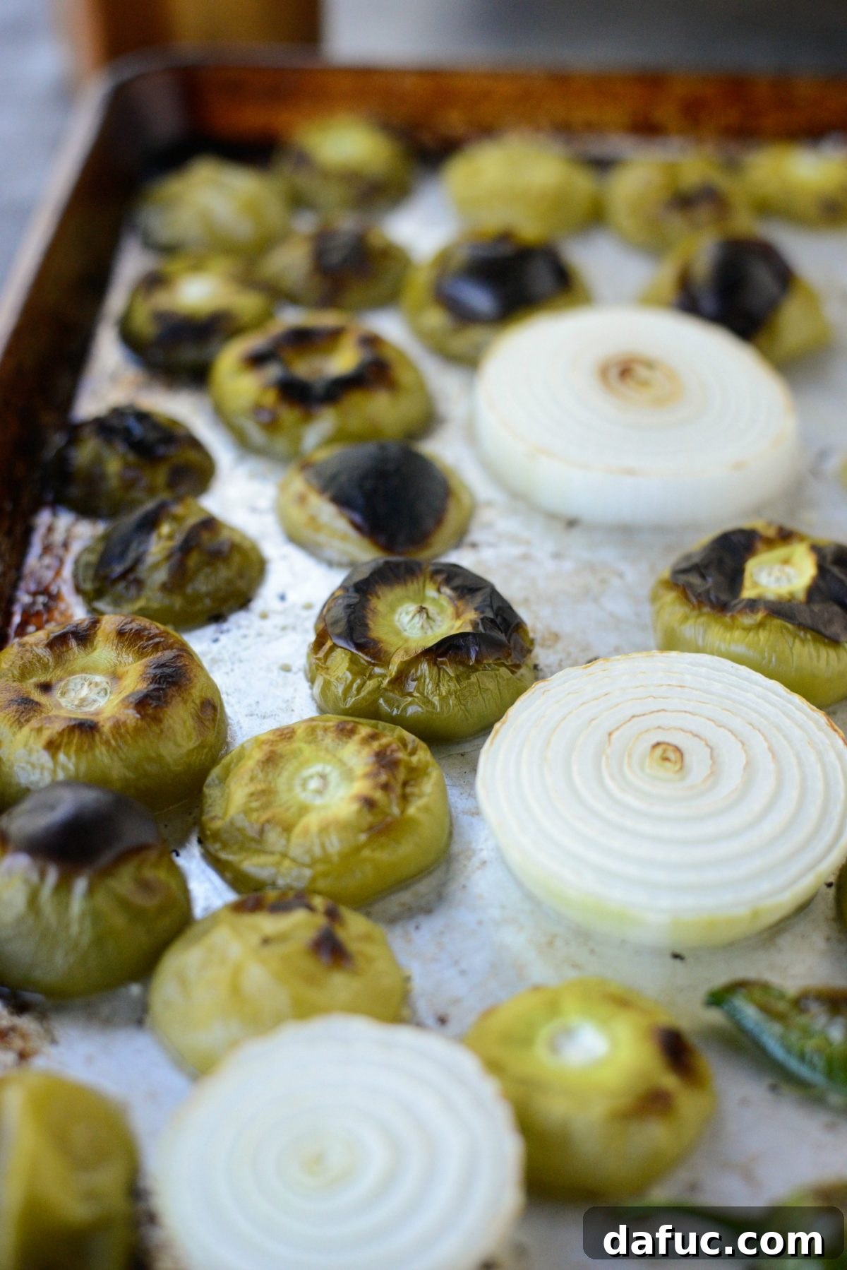 Effortless Zingy Tomatillo Salsa Verde 6 Broiled tomatillos, jalapeño, onion, and garlic with charred spots