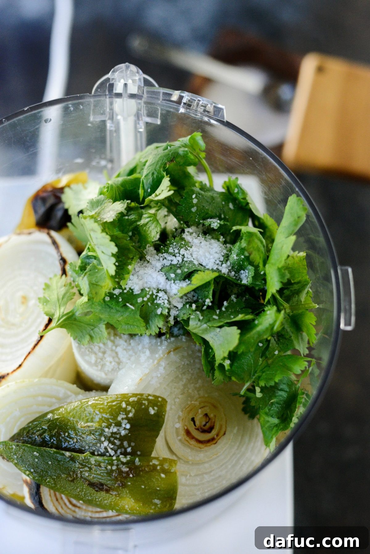Effortless Zingy Tomatillo Salsa Verde 10 Cilantro and salt added to the food processor for salsa verde