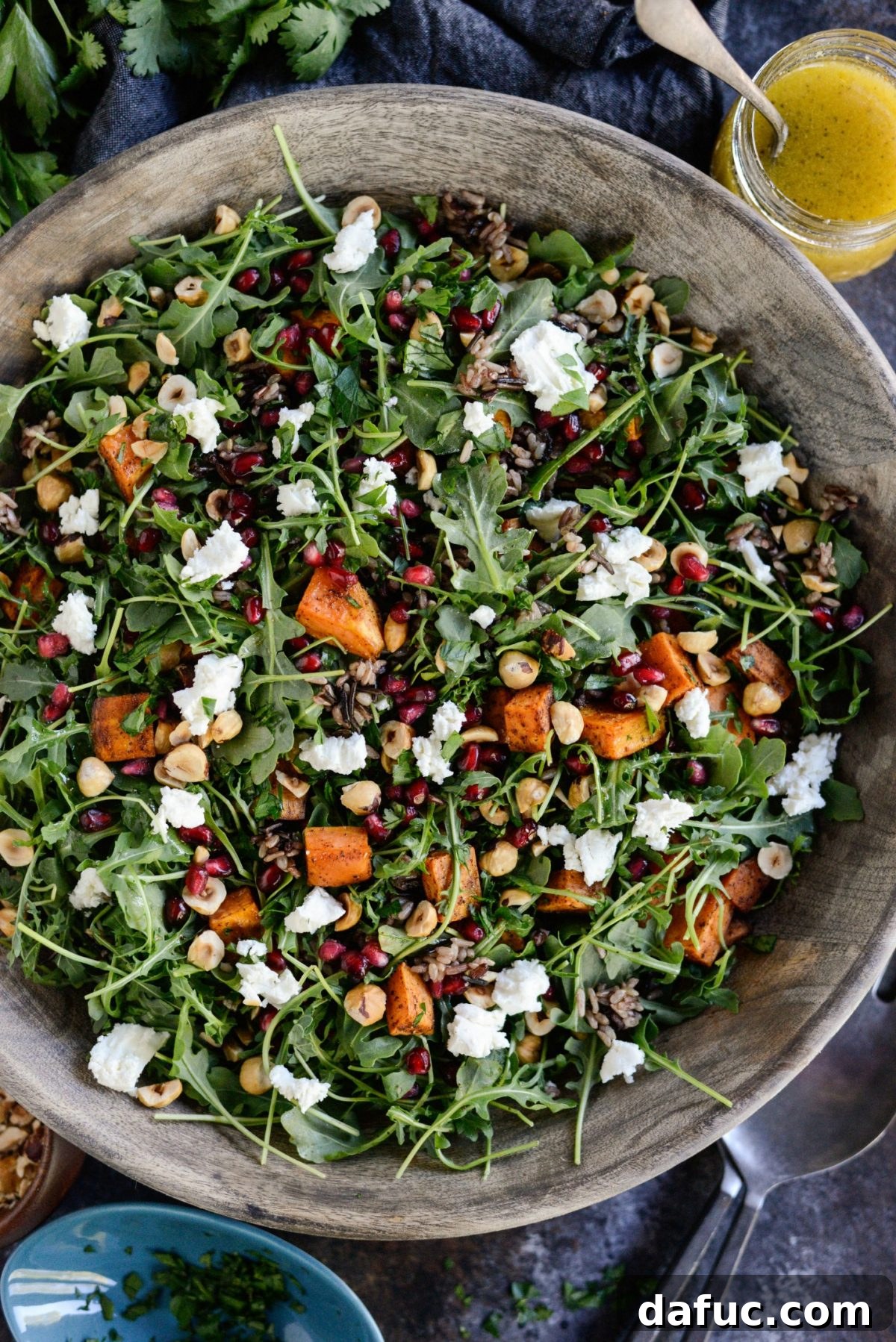 Hearty Sweet Potato Wild Rice Arugula Salad with Goat Cheese