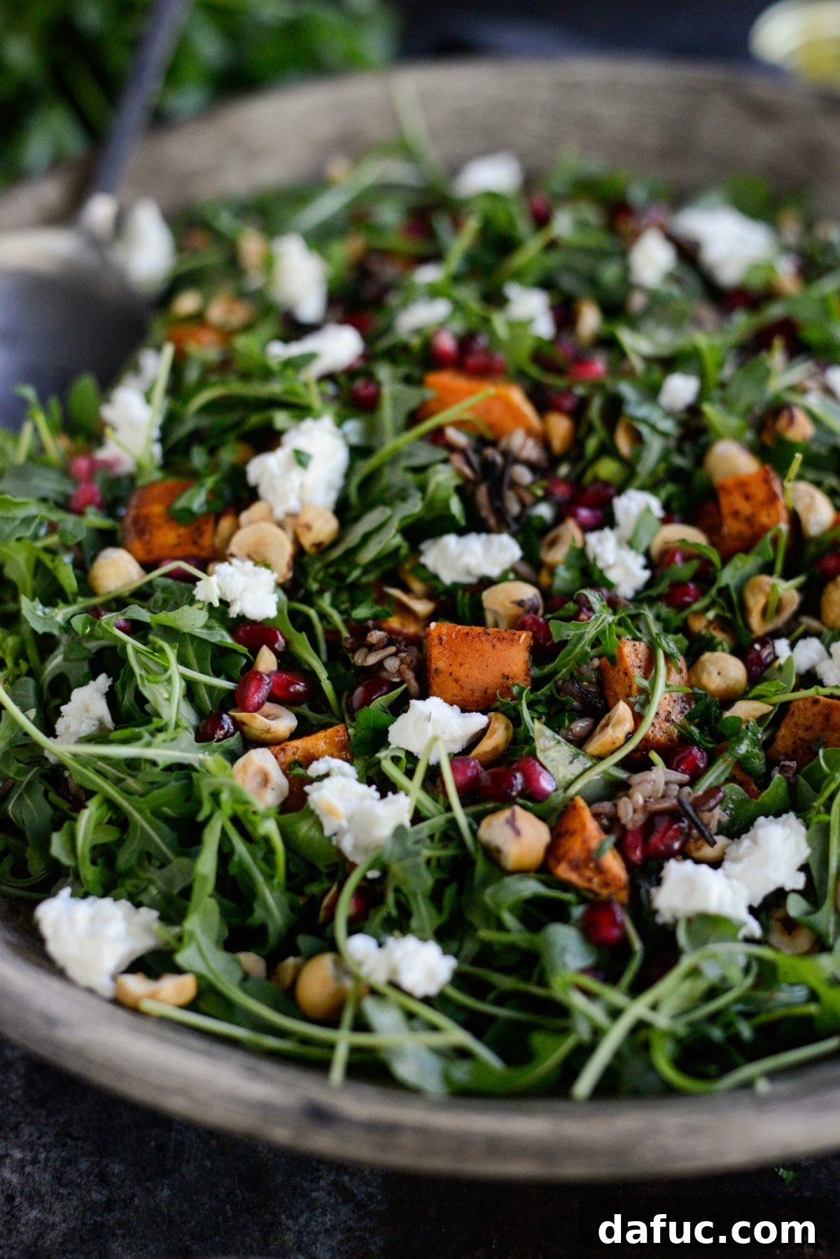 Close-up of a delicious serving of Sweet Potato Wild Rice Arugula Salad