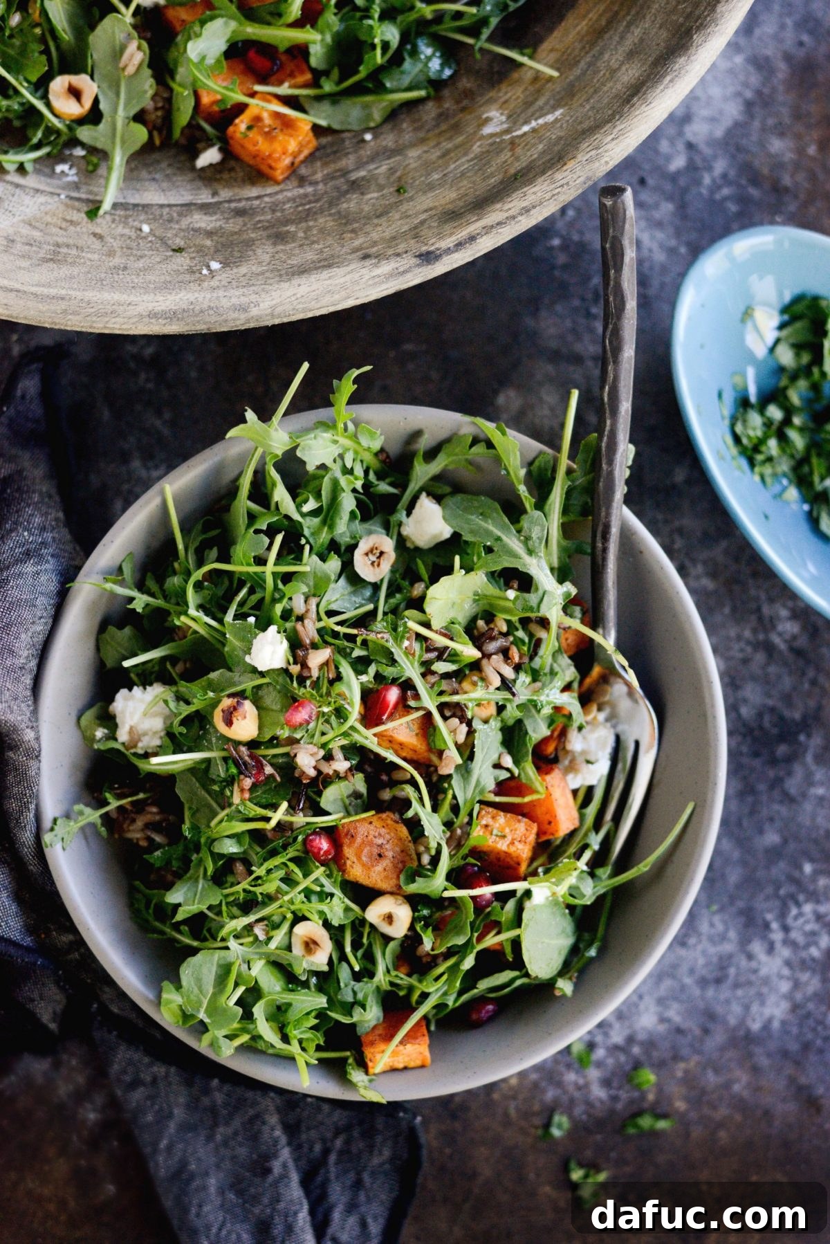 Top-down view of Sweet Potato Wild Rice Arugula Salad