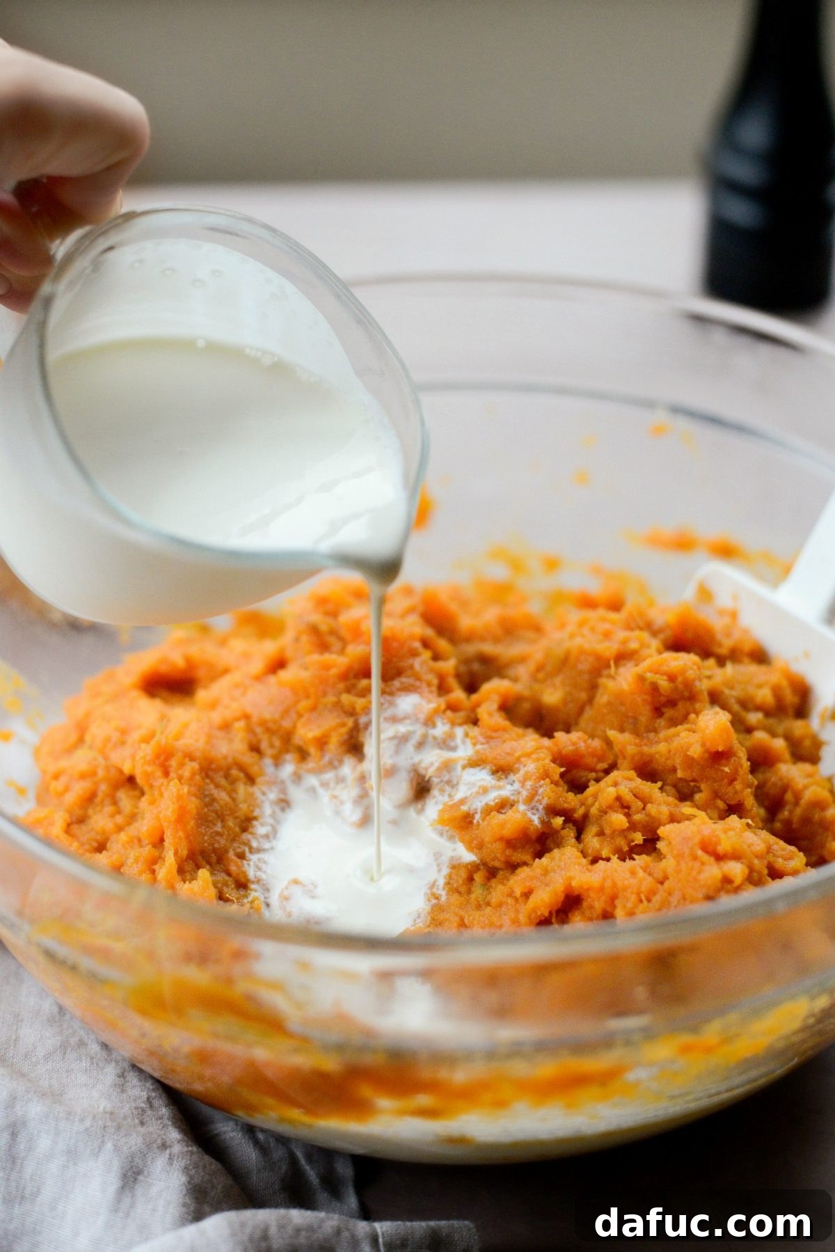 Silky Maple Sweet Potato Mash 10 Adding heavy cream to the sweet potato mash