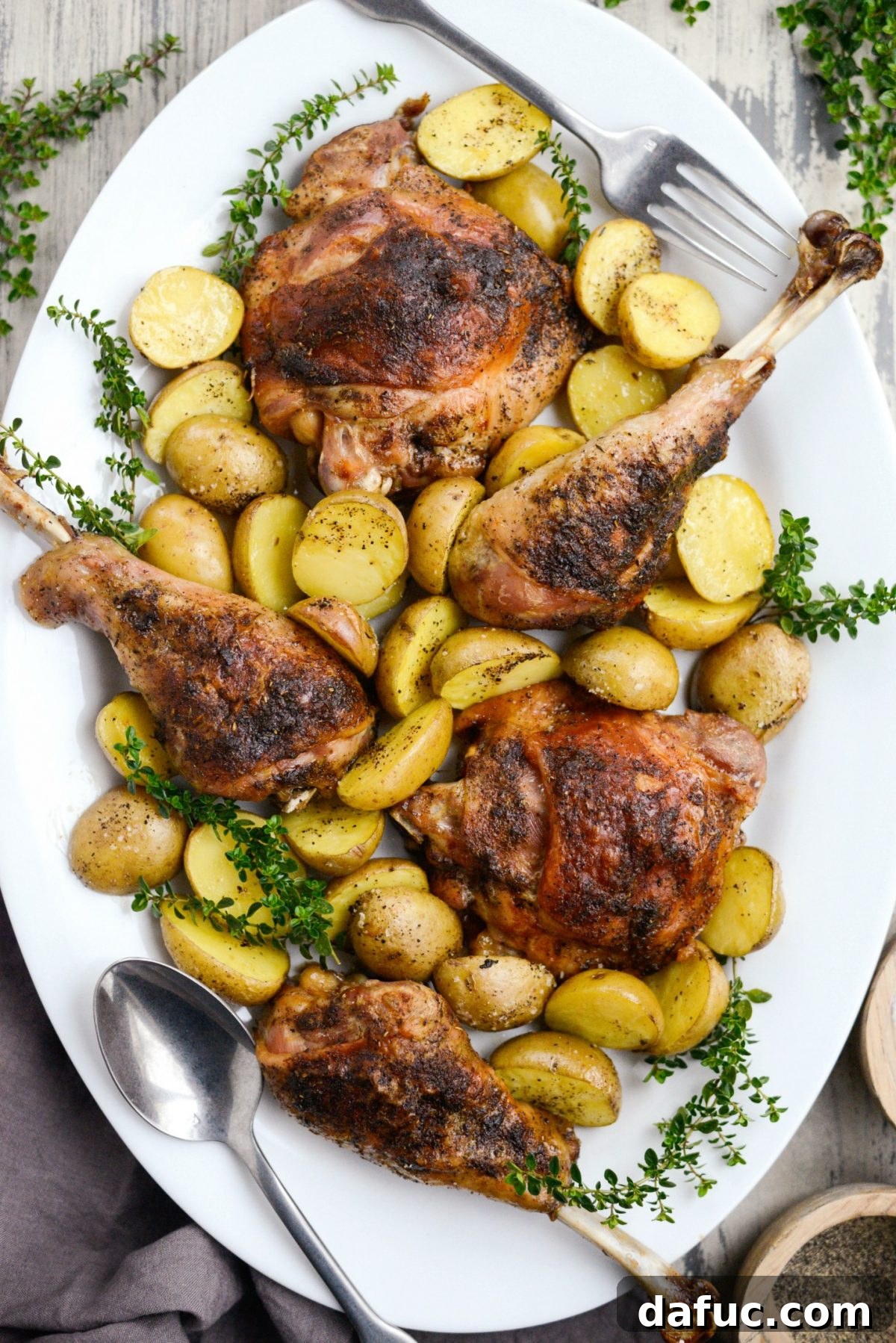 Perfectly Roasted Turkey Thighs and Drumsticks, ready to serve in a roasting pan