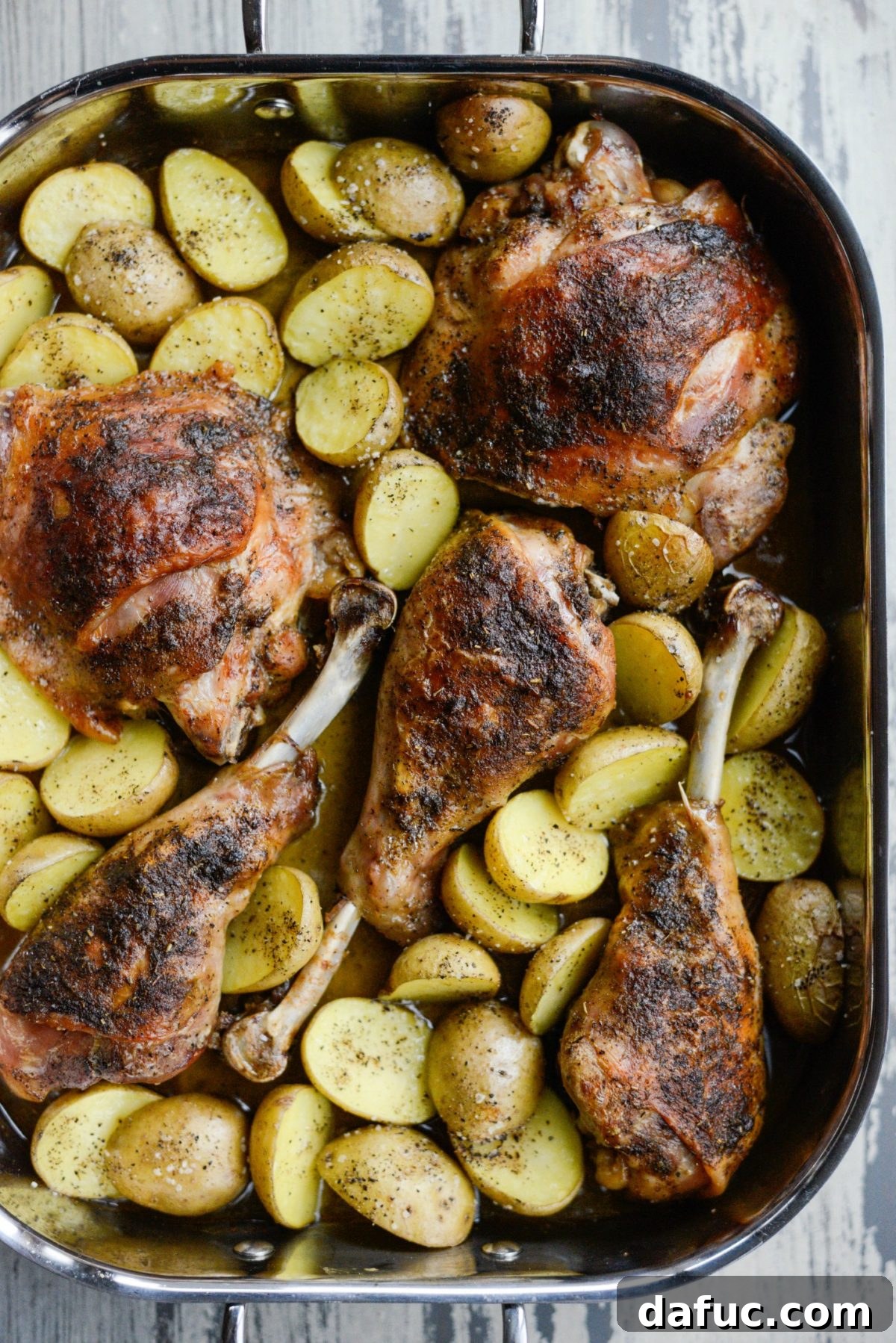 Delicious One-Pan Roasted Turkey Thighs and Drumsticks with potatoes, fresh out of the oven