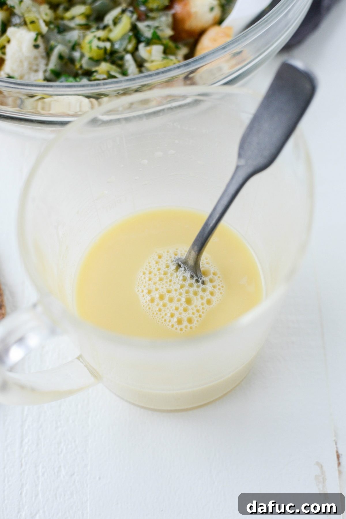 Artisan Herb Sourdough Dressing 14 combine last bit of broth with eggs, salt and pepper.