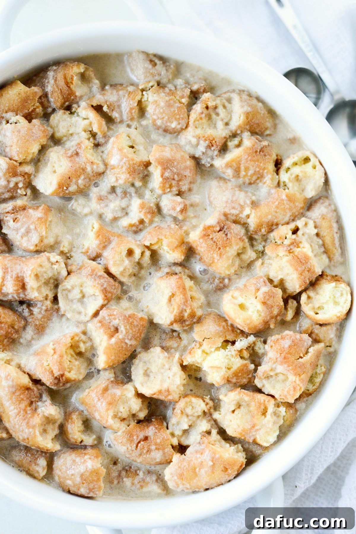 Autumn Spiced Doughnut Bread Pudding 15 Covering the Cider Mill Doughnut Bread Pudding with aluminum foil before baking