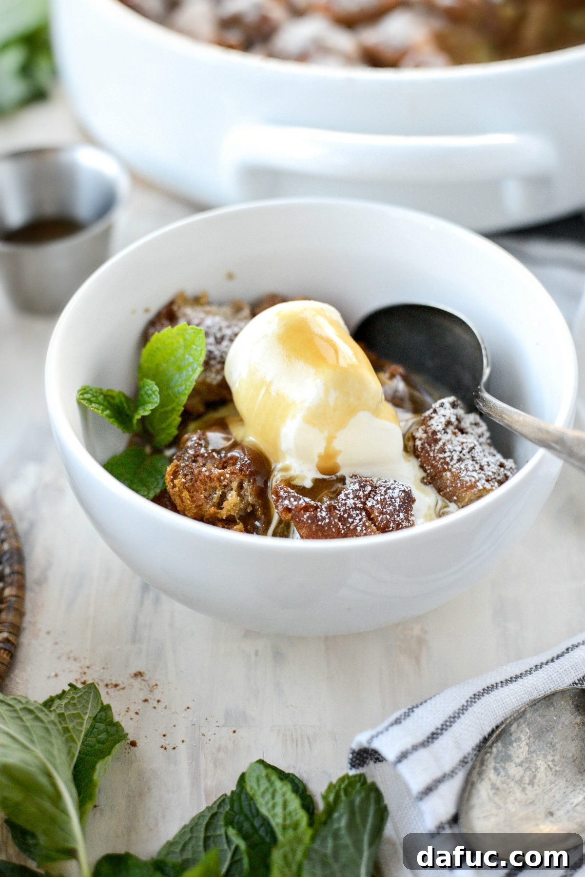 Autumn Spiced Doughnut Bread Pudding 26 Another view of Cider Mill Doughnut Bread Pudding generously topped with Butter Rum Sauce and vanilla ice cream