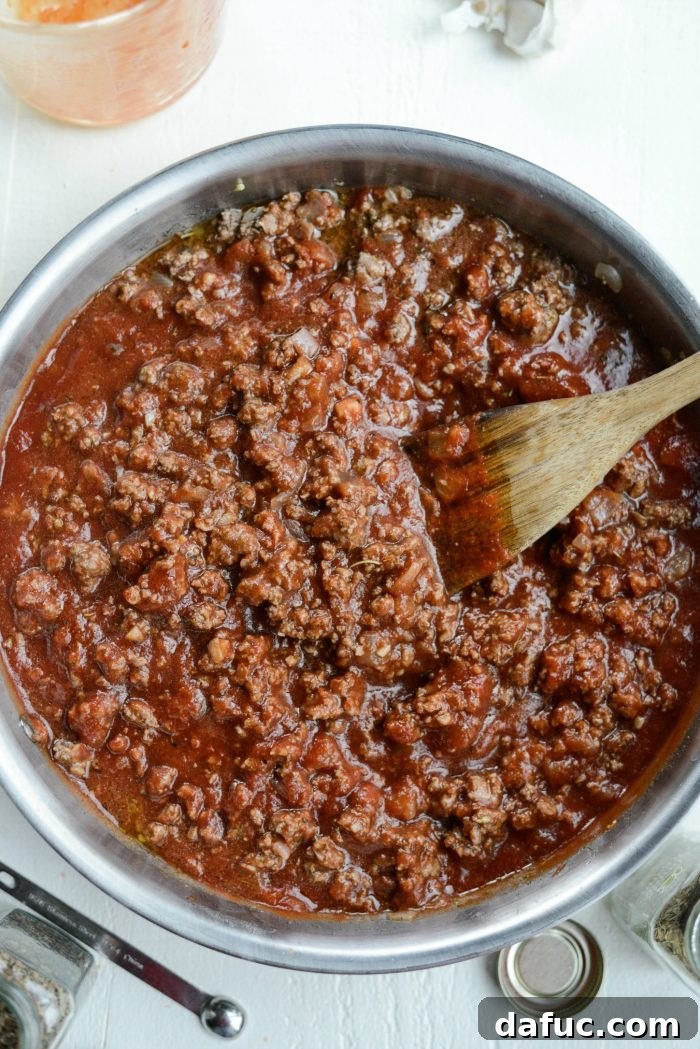 Basic meat sauce simmering to perfection