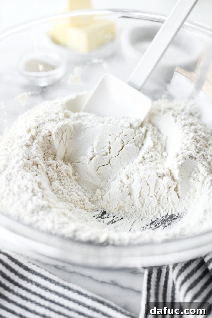 Effortless Homemade Croissant Perfection 6 Combining bread flour and salt in a mixing bowl