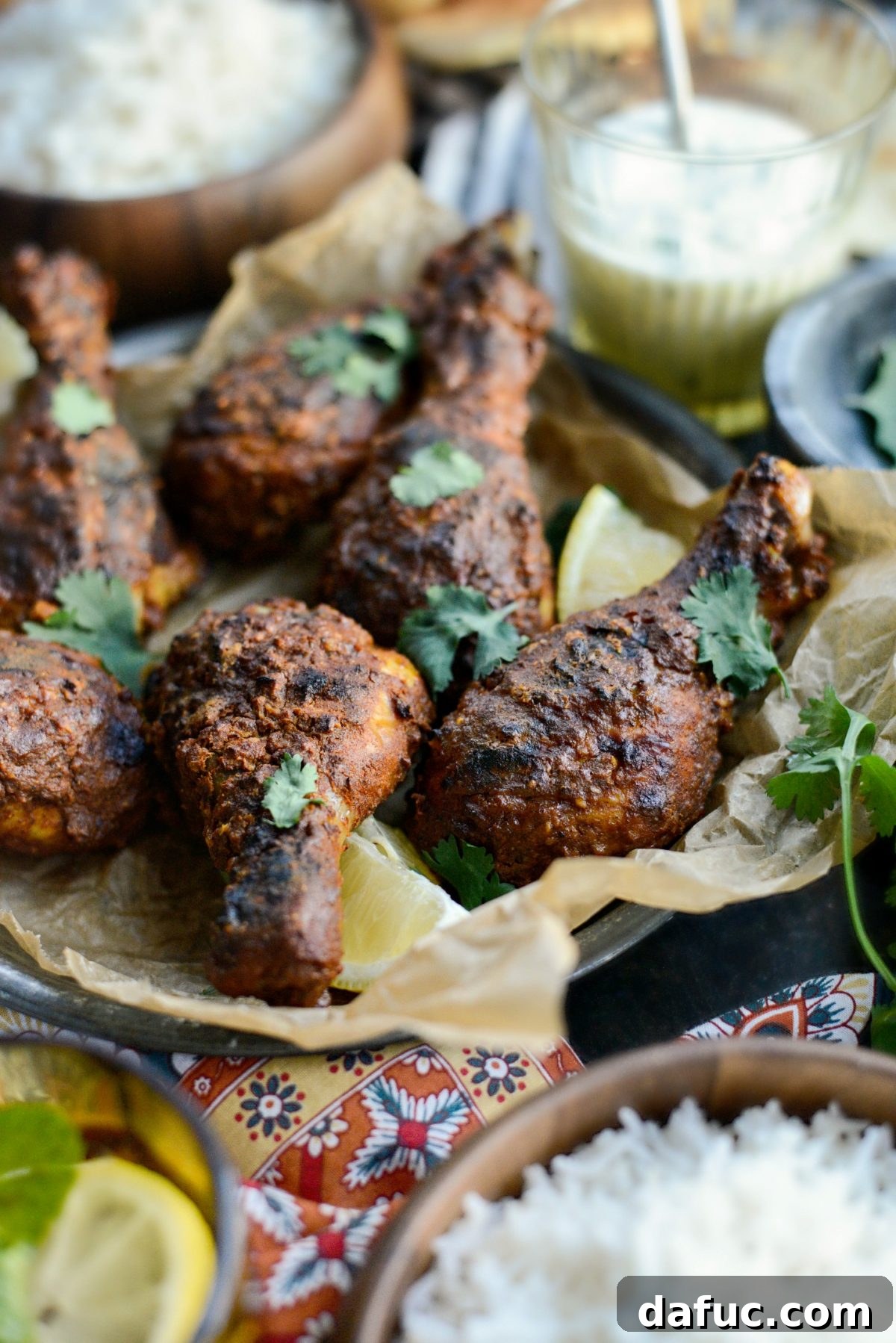 Another view of the beautifully cooked Oven Tandoori Chicken with crispy skin.