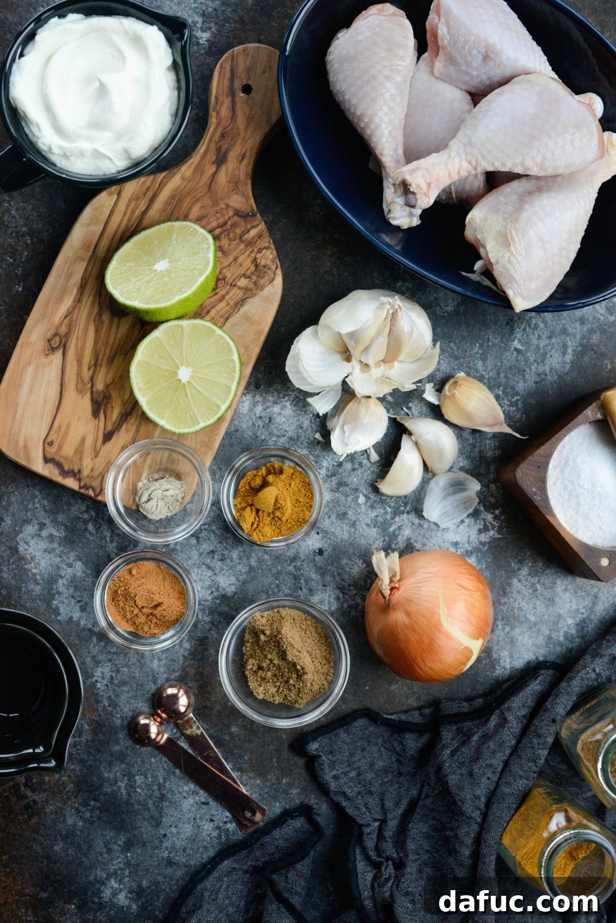A bowl of vibrant red tandoori marinade ready for the chicken.