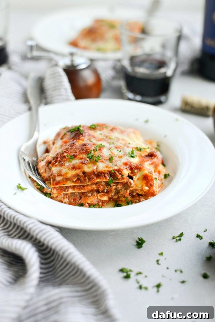 Homemade Three-Meat Bolognese Lasagna, beautifully baked and garnished