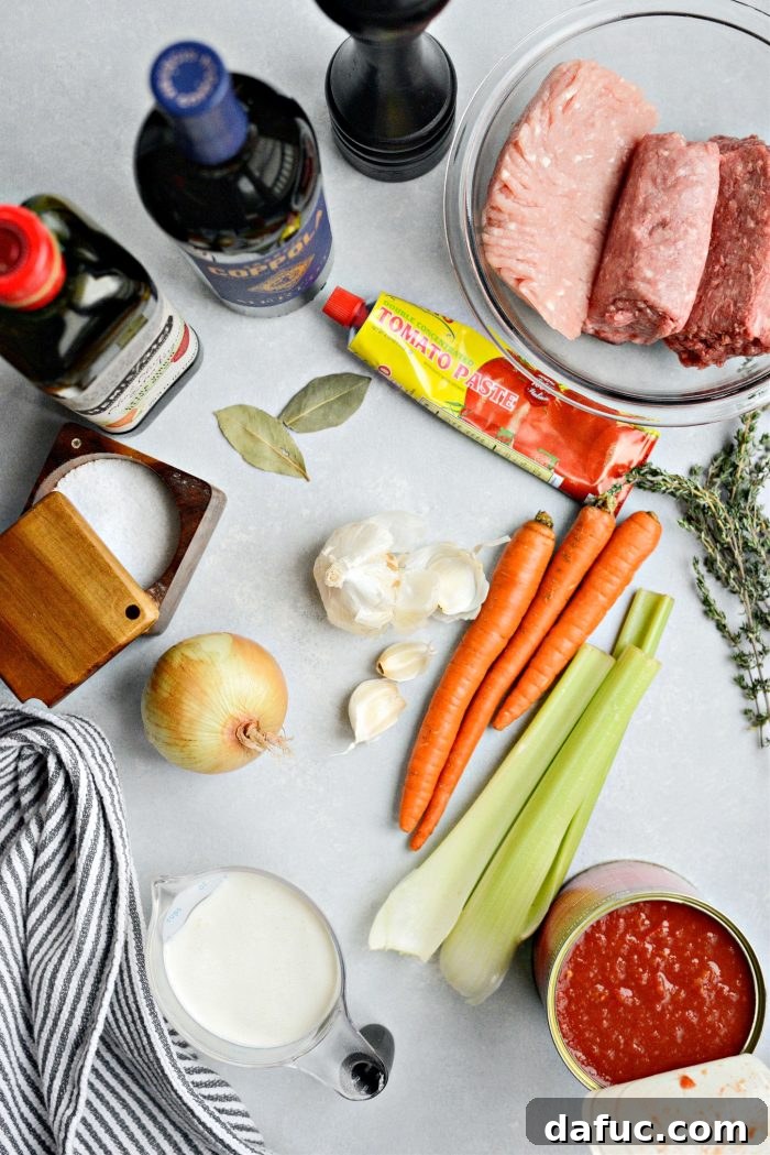 Ingredients laid out for Homemade Three-Meat Bolognese Lasagna