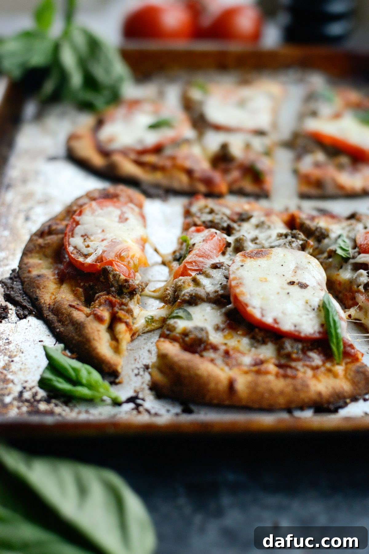 Levantine Lamb Margherita Pizza 19 A final, beautifully styled overhead shot of the Lebanese Margherita Lamb Pizza on a wooden board, with a knife ready for slicing.