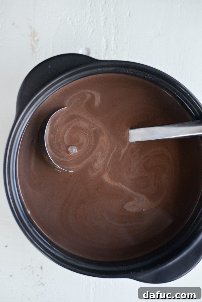 Mocha Magic 14 The finished Espresso Hot Chocolate being stirred in the pot before serving
