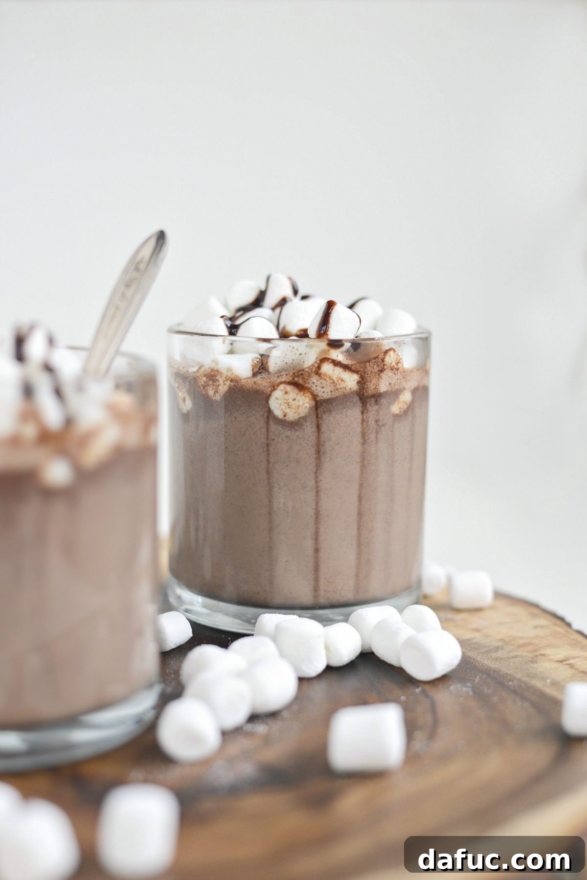 Mocha Magic 3 A second view of the Espresso Hot Chocolate, showcasing its rich texture and a topping of marshmallows and chocolate syrup