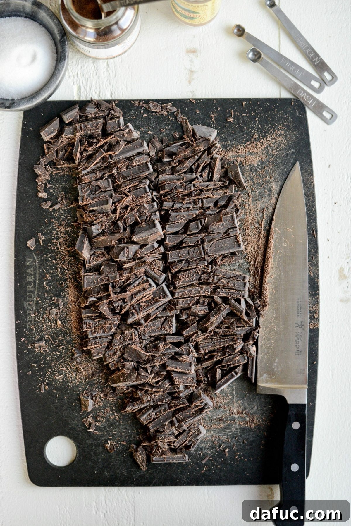 Mocha Magic 6 Finely chopped semi-sweet chocolate on a cutting board, ready to be added to the hot chocolate mixture