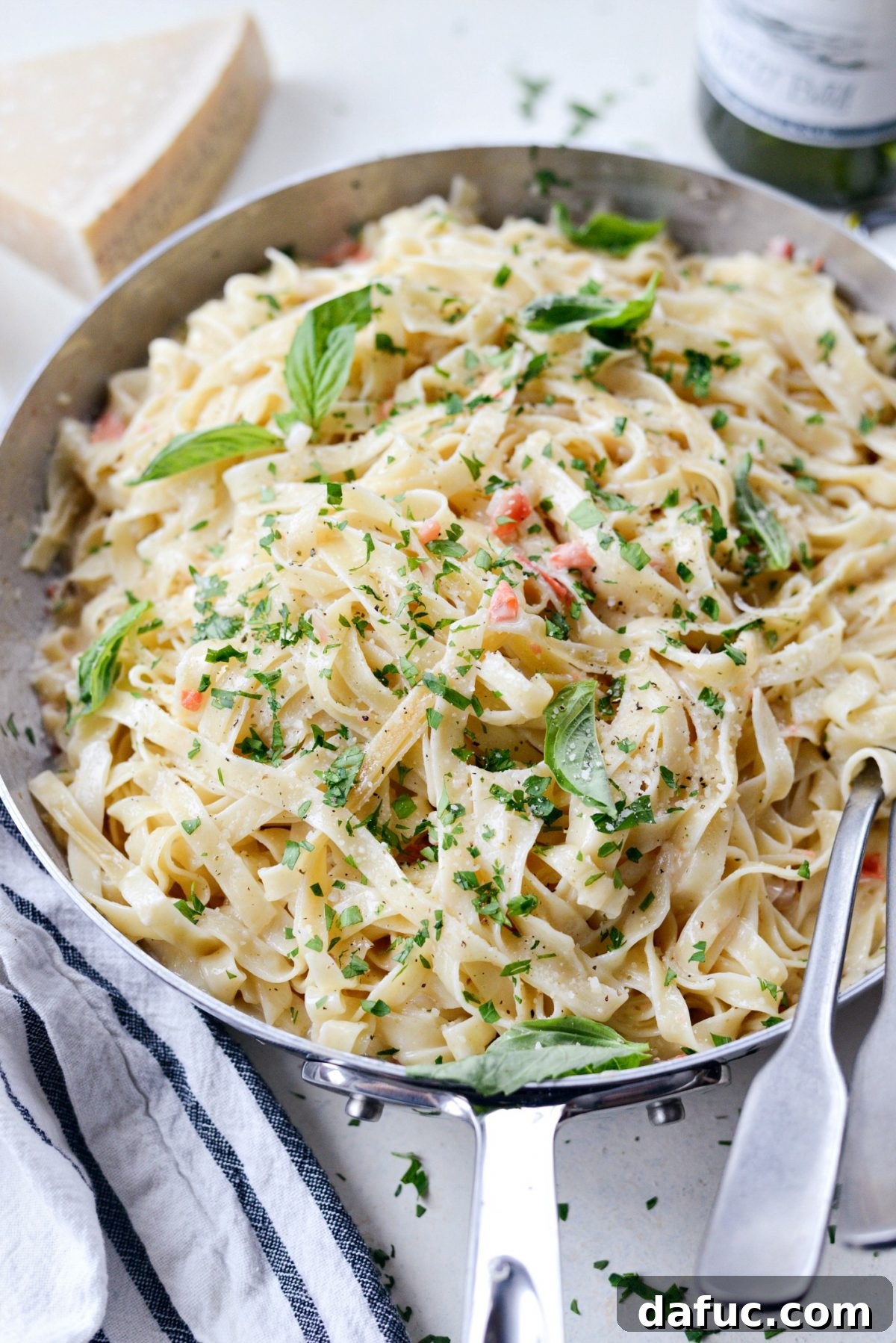 A festive table setting featuring Christmas Fettuccine, ready to be enjoyed.