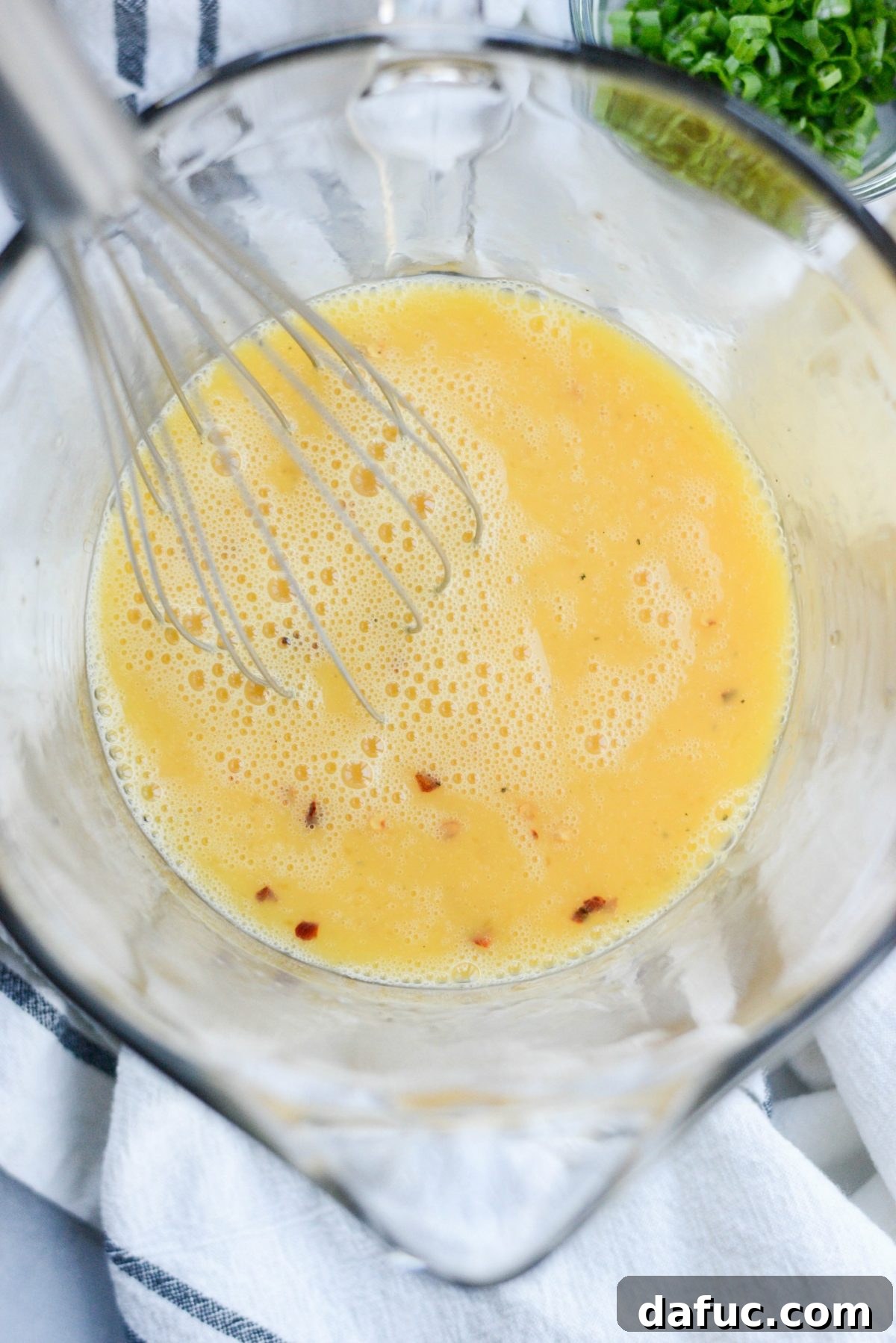 Whisking the egg mixture vigorously