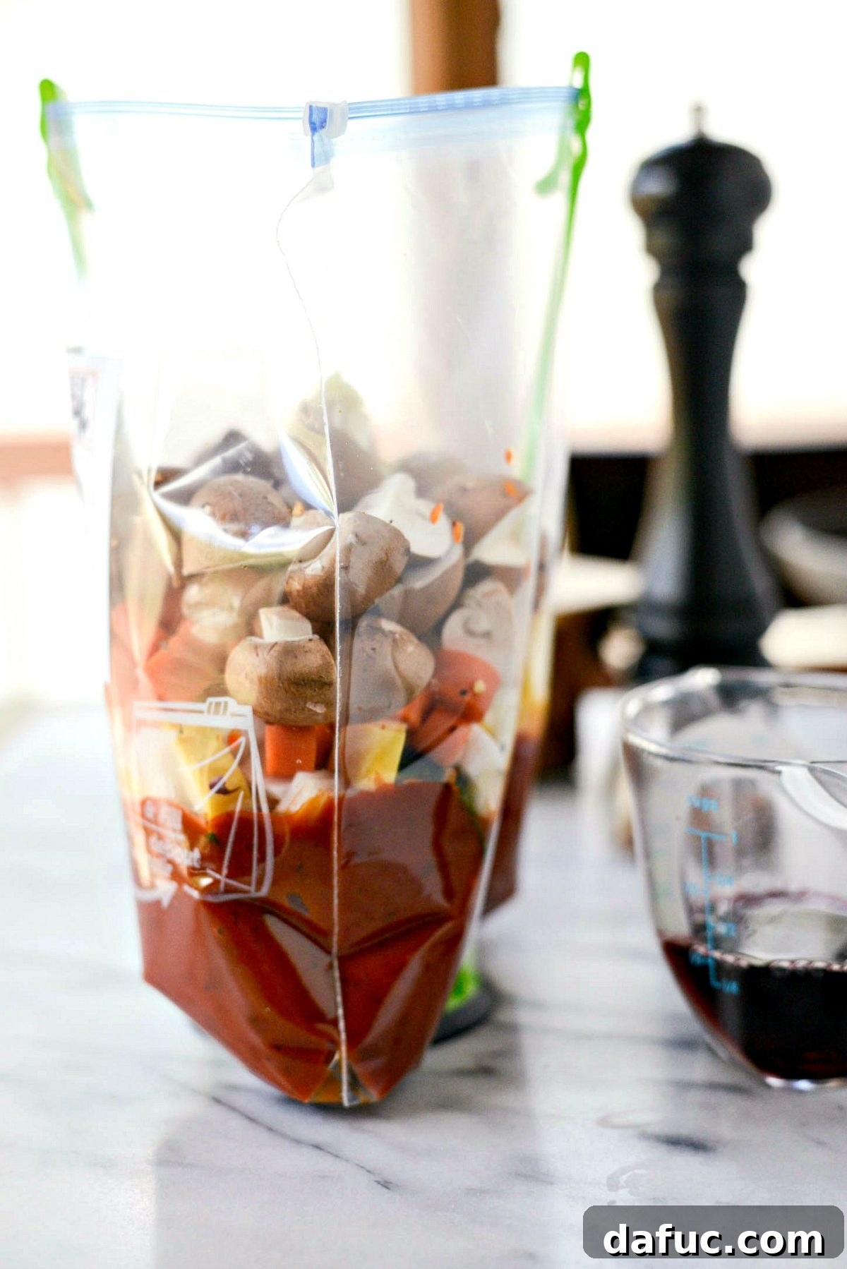 fill freezer bag with marinara and veggies