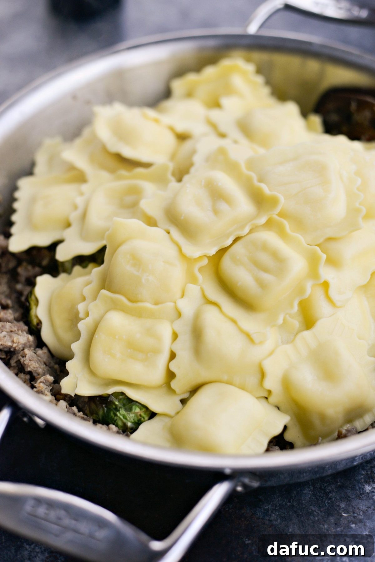 Hearty Italian Sausage Brussels Sprout Ravioli 11 Adding cooked ravioli to the skillet