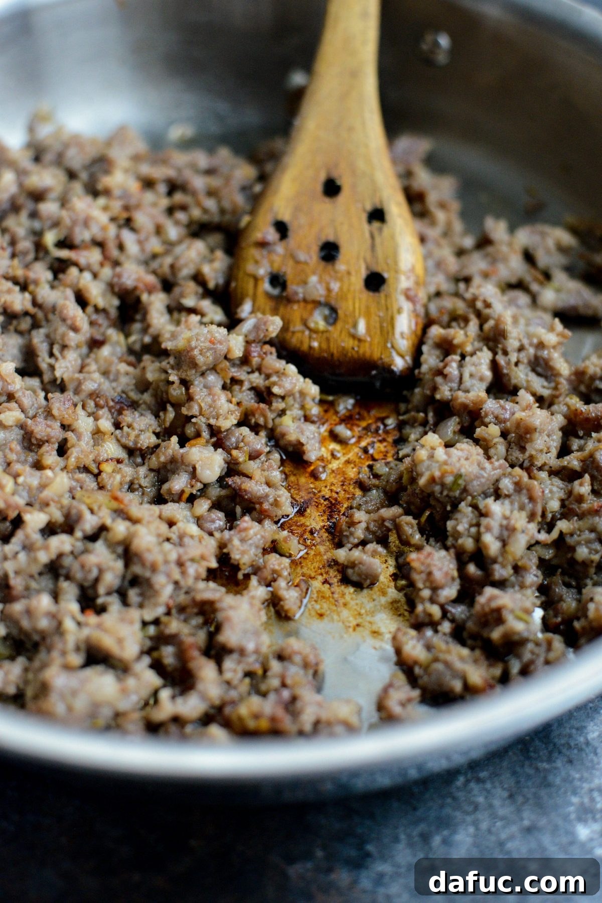 Hearty Italian Sausage Brussels Sprout Ravioli 7 Adding and browning Italian sausage in a skillet