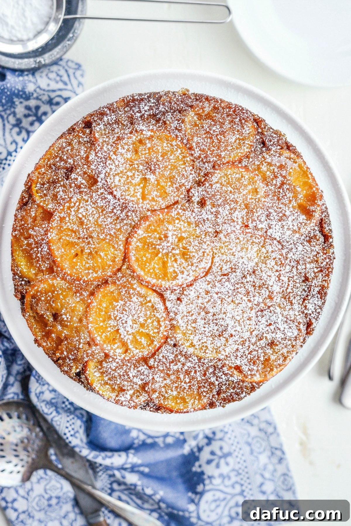 Golden Clementine Bliss Cake 17 Beautifully inverted Clementine Upside-Down Cake on a serving plate