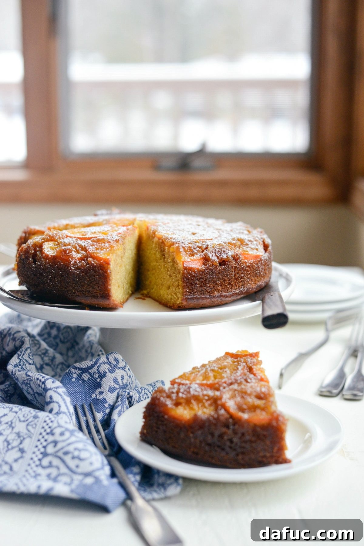 Golden Clementine Bliss Cake 3 Homemade Clementine Cake on a cooling rack, showcasing its golden crust