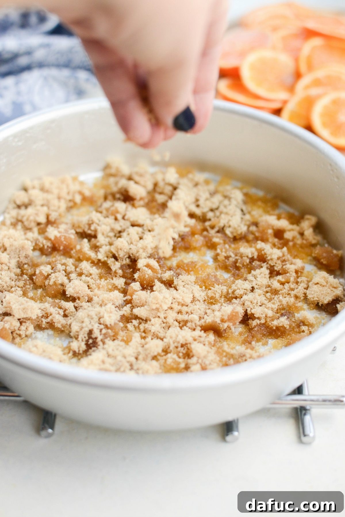 Golden Clementine Bliss Cake 5 Melted butter and brown sugar ready for the cake pan base of the upside-down cake