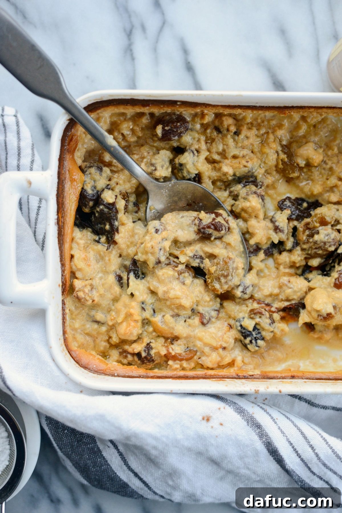 My Grandma's Rice Pudding Recipe - a golden brown, creamy baked rice pudding in a baking dish