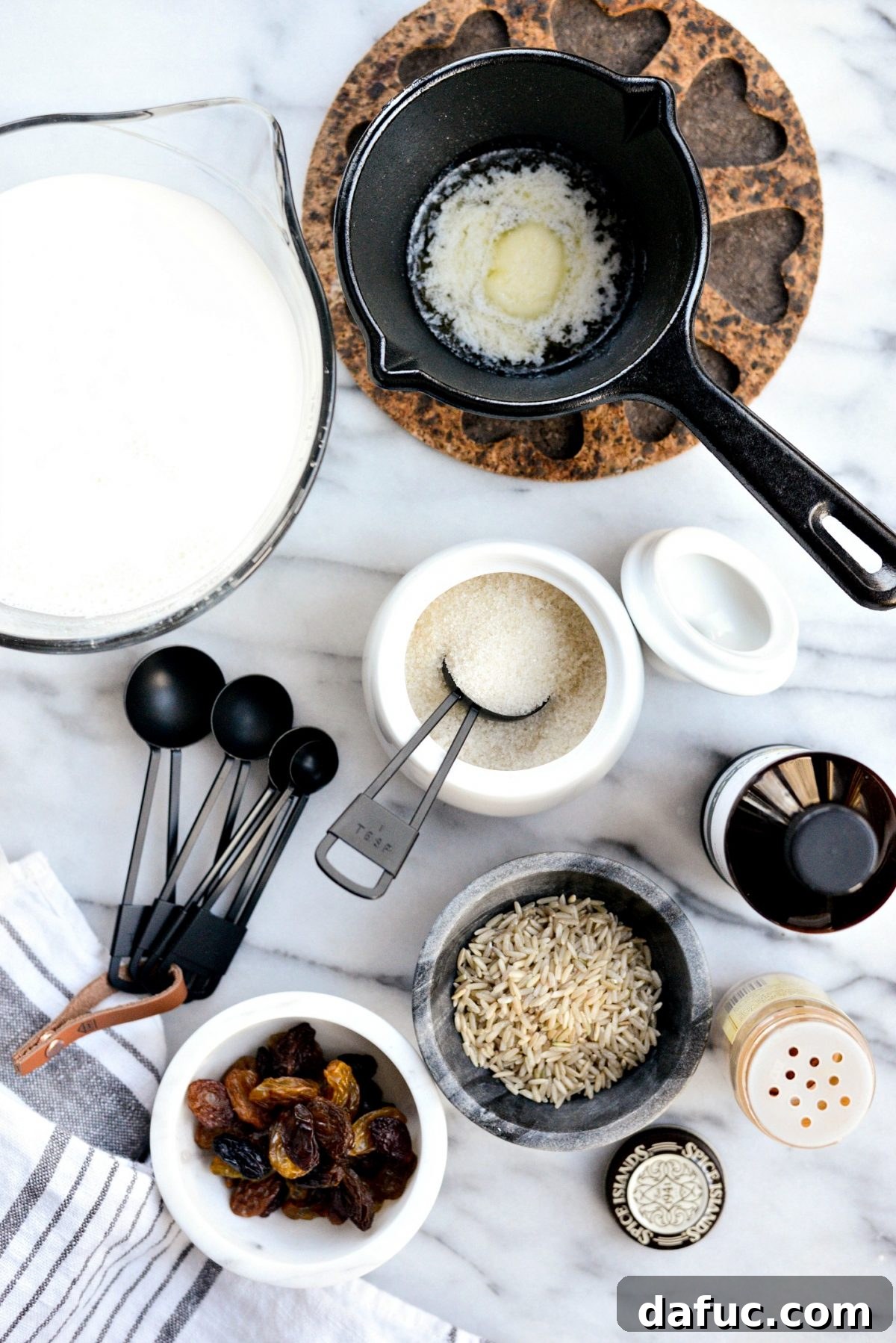 Ingredients for My Grandma's Rice Pudding Recipe laid out on a counter