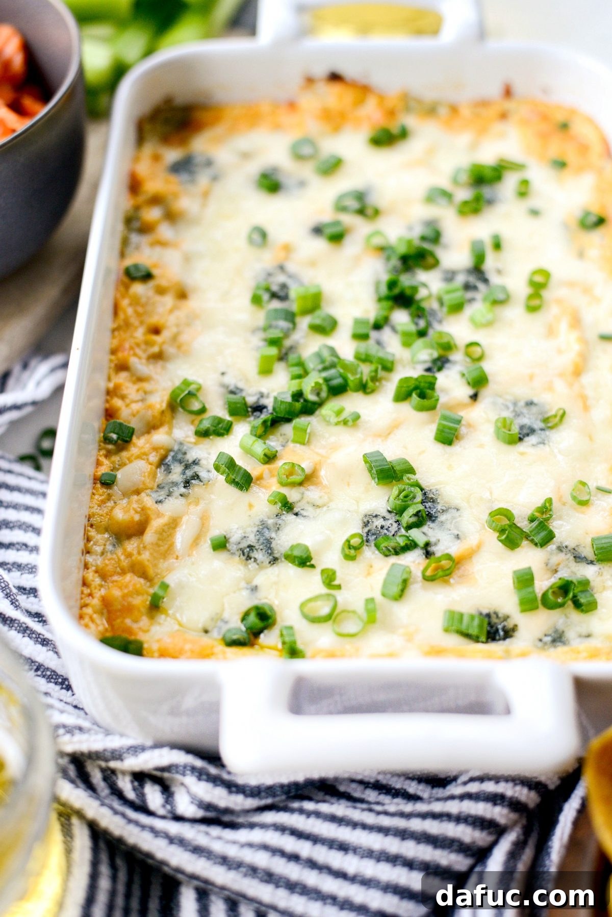 Best Baked Buffalo Chicken Dip fresh from the oven, hot and bubbly