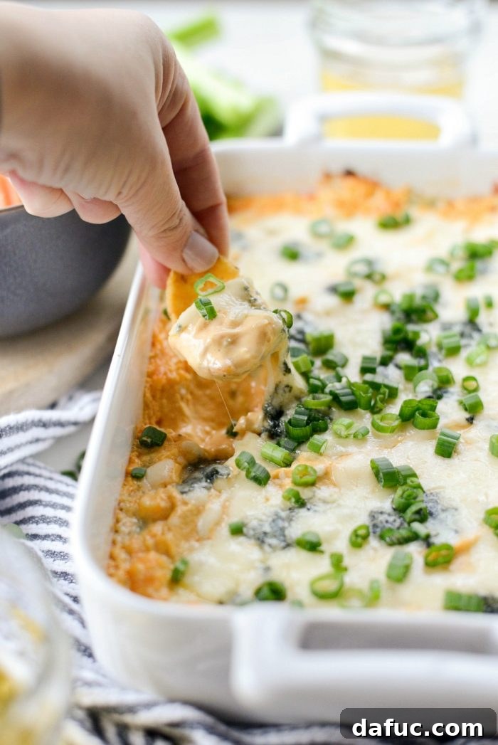 Close-up of Best Baked Buffalo Chicken Dip, gooey and spicy